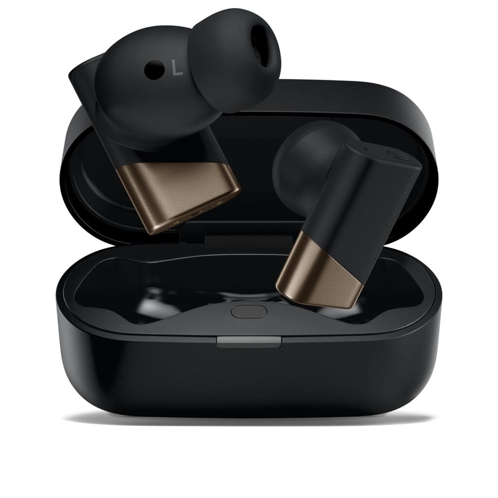 A pair of Status Audio Pro X True Wireless - GoldenSound Edition earbuds are resting in and above an open black charging case on a white background, highlighting the sleek design of this limited-edition release from Status Audio.