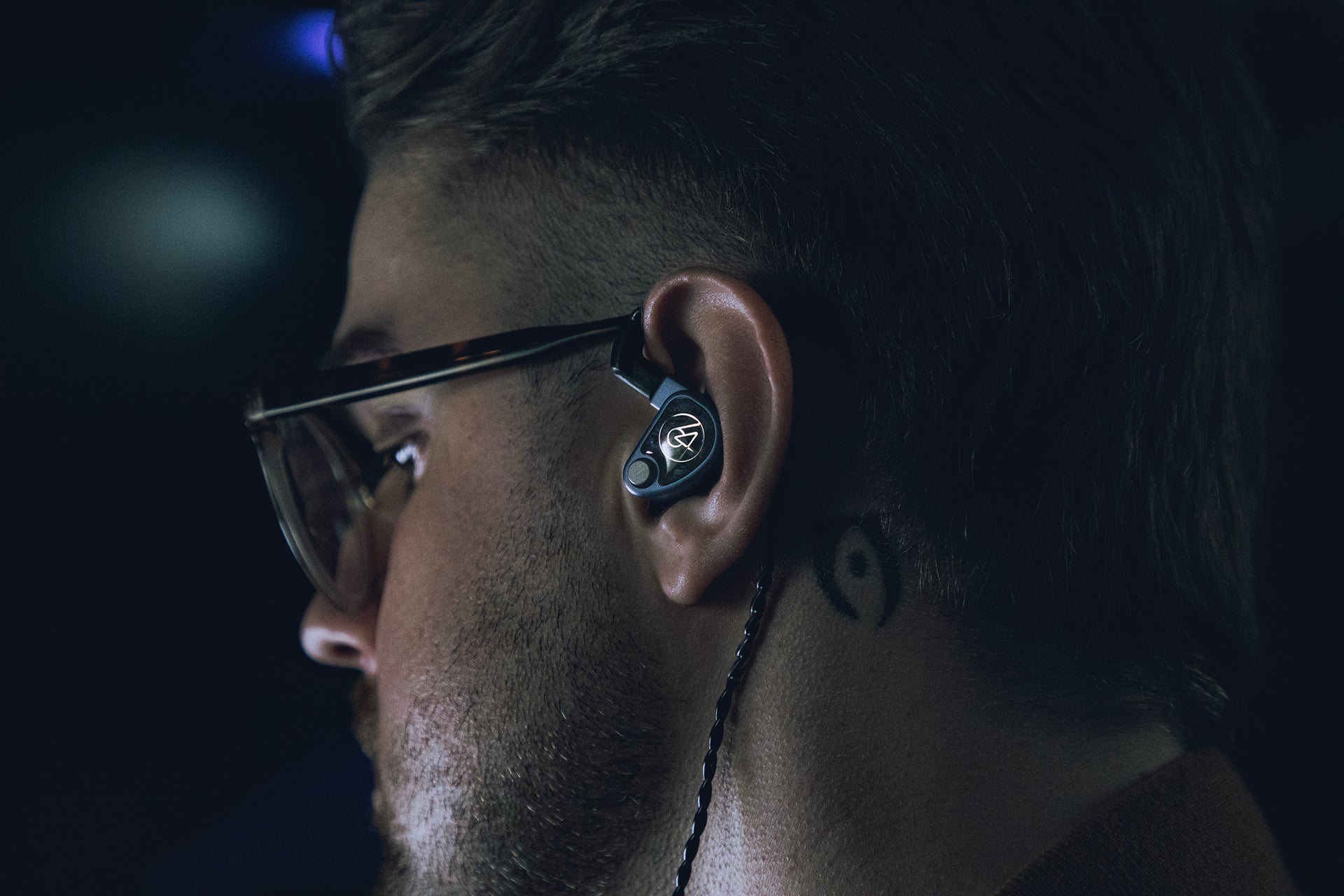64 audio u4s in-ear headphones in human male ears