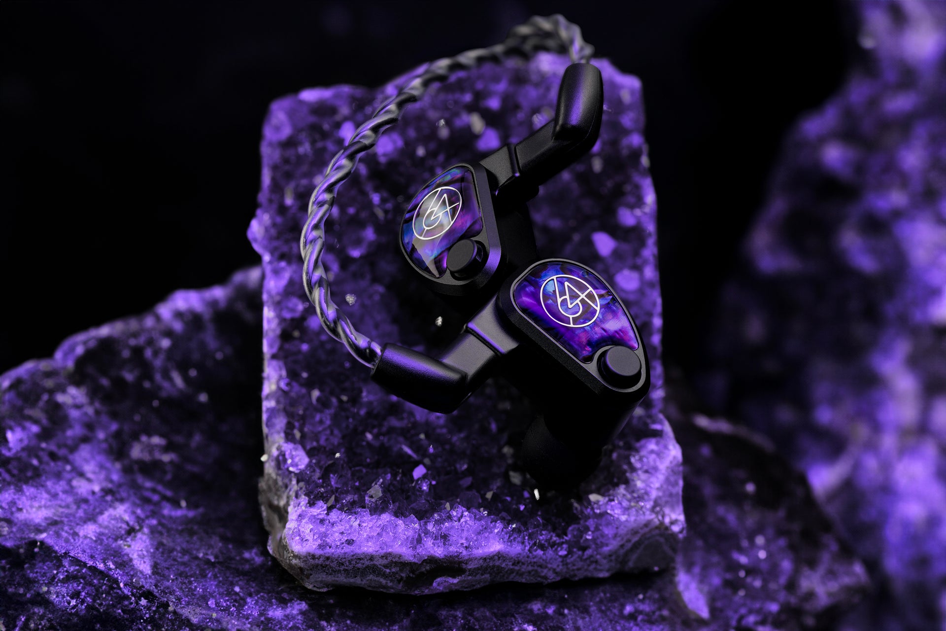 64 Audio Volür In-Ear Headphones on purple gemstone lifestyle