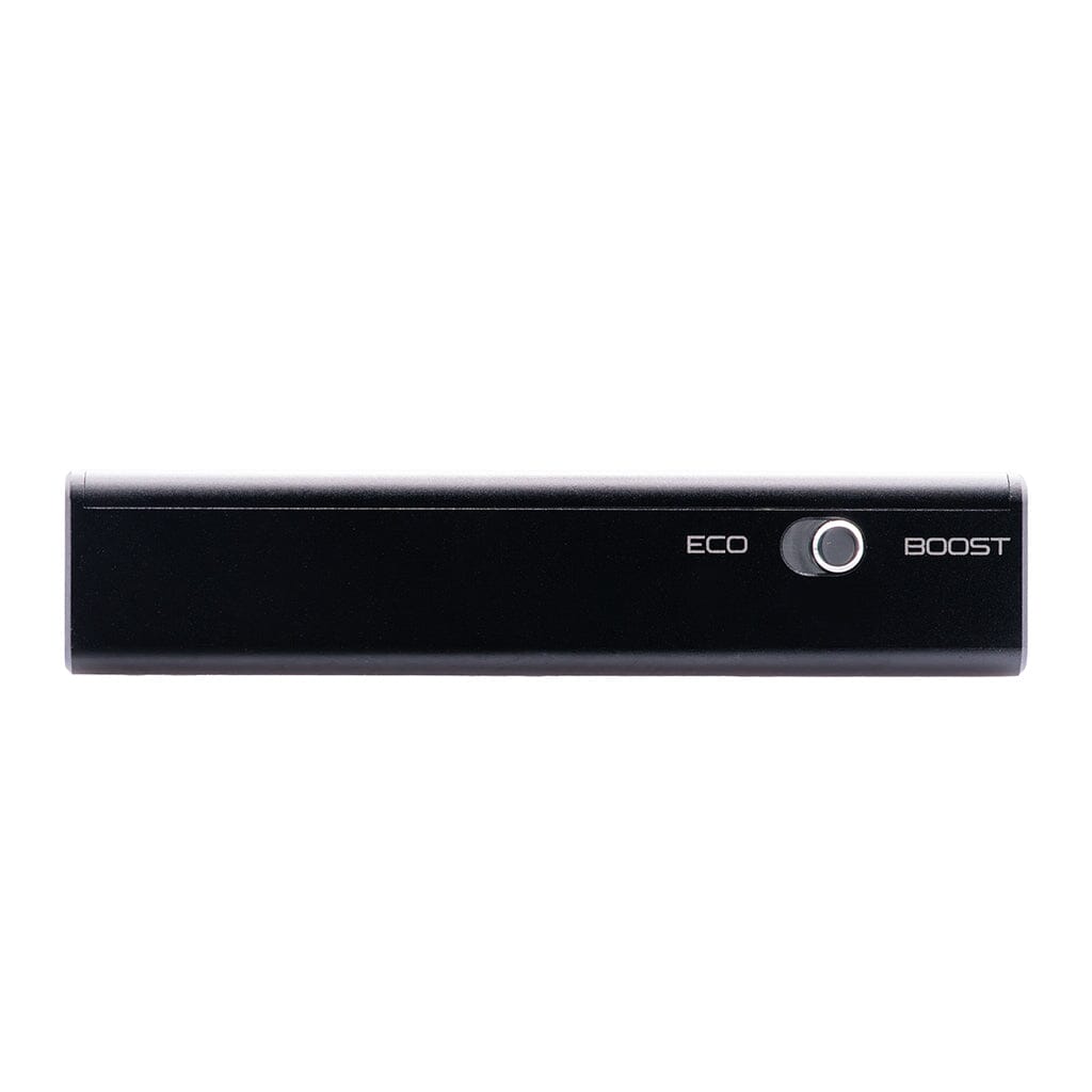 The CrinEar Protocol Max by CrinEar is a rectangular black headphone amplifier with a round center button. "ECO" and "BOOST" are printed on either side. The front view is shown against a white background.