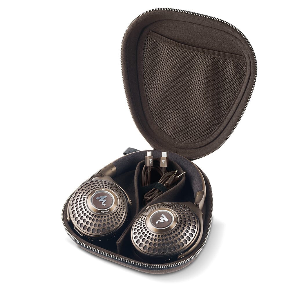 A pair of Focal Bathys MG Wireless Headphones by Focal, featuring brown circular metallic mesh ear cups, shown inside an open zippered carrying case with an inner mesh pocket and included cables.