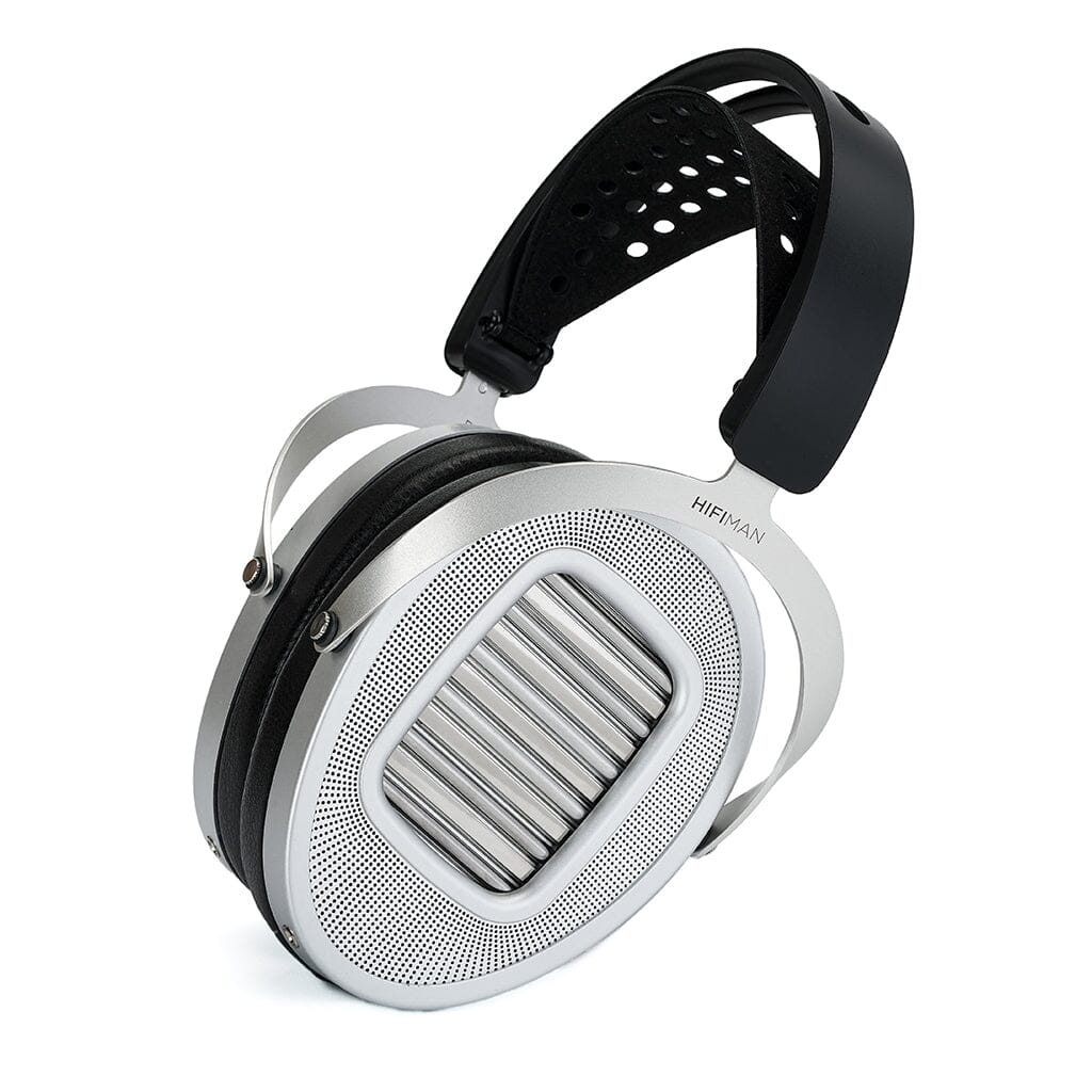 The Hifiman Ananda Unveiled Headphones feature a silver open-back design with horizontal grilles, a perforated black cushioned headband, the Hifiman logo on the metal frame, and a supernano diaphragm for outstanding sound clarity.