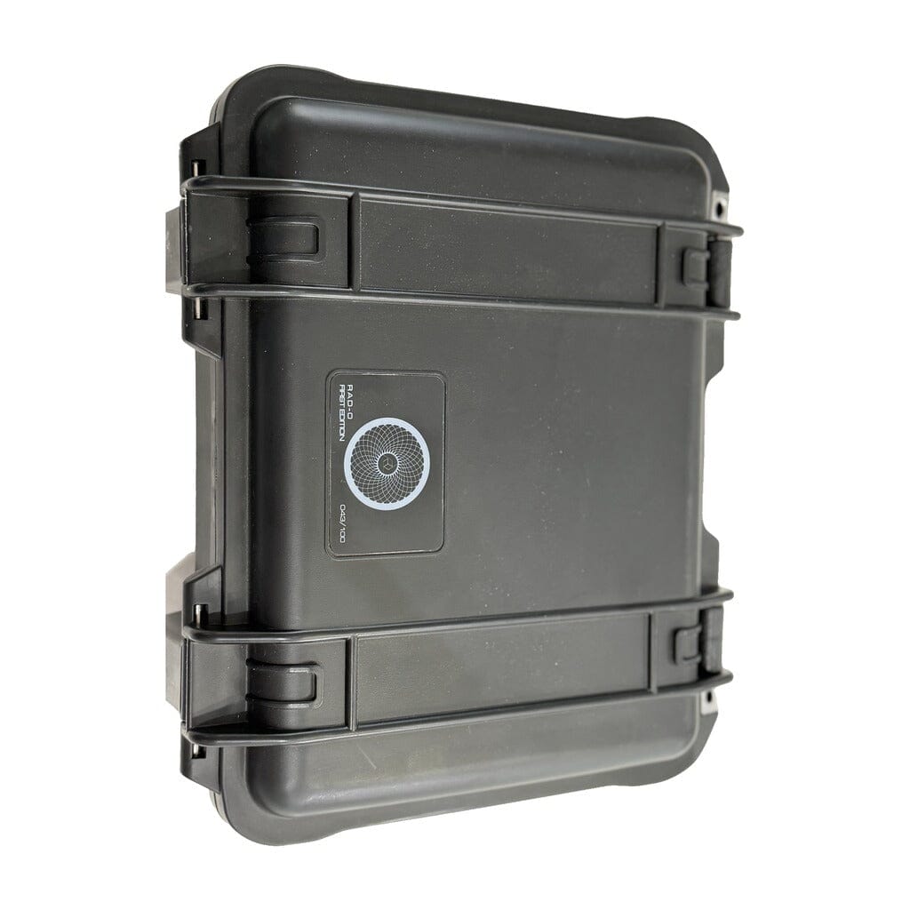 A black, hard plastic protective case featuring two side latches and a circular dial or combination lock on the front panel is displayed against a white background. Designed for secure and reliable protection, this case is ideal for storing premium audio equipment like the Rosson Audio Design RAD-0 Headphones (Open Box C Condition - Clearance - 215) by Rosson Audio Design.