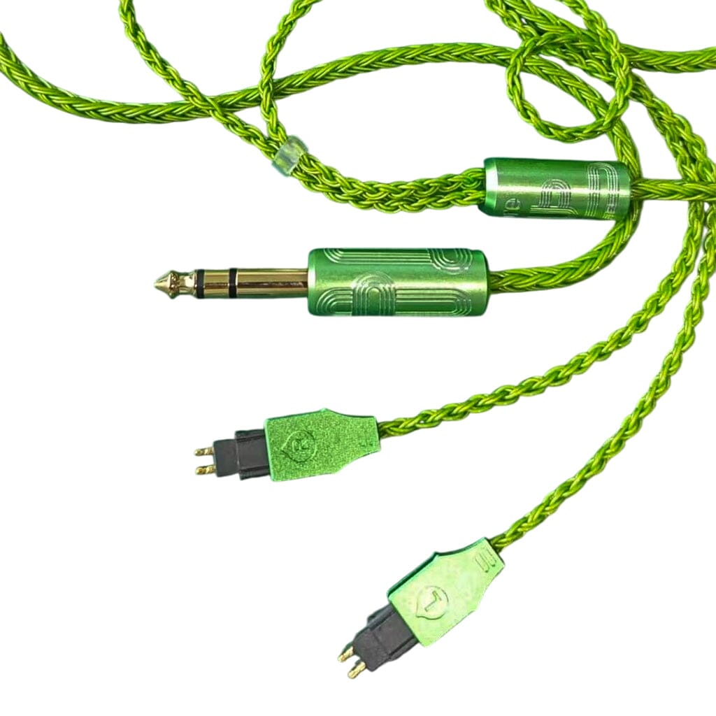 The Listenmore Etched Headphone Cable for Sennheiser HD 600 Series features a green braided design, metallic green housings, dual-pin connectors, and a large 1/4-inch plug, shown against a white background.