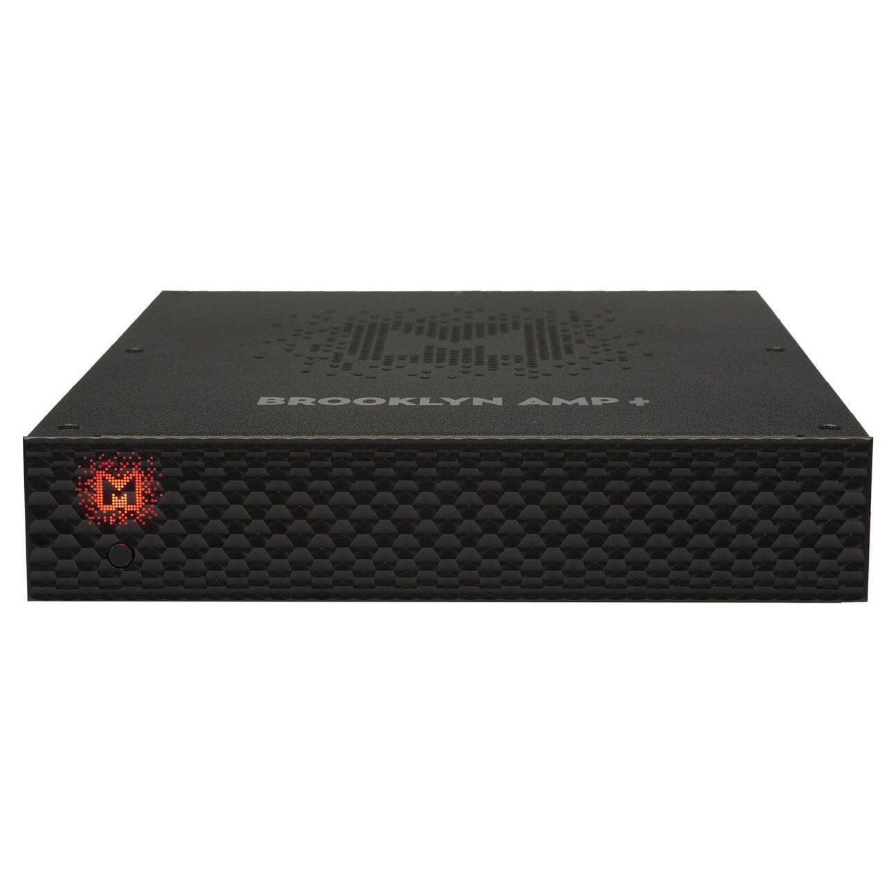 A black Mytek Digital Brooklyn Amp+ Headphone Amplifier with a textured front, a red illuminated M logo on the left, and the product name on top.