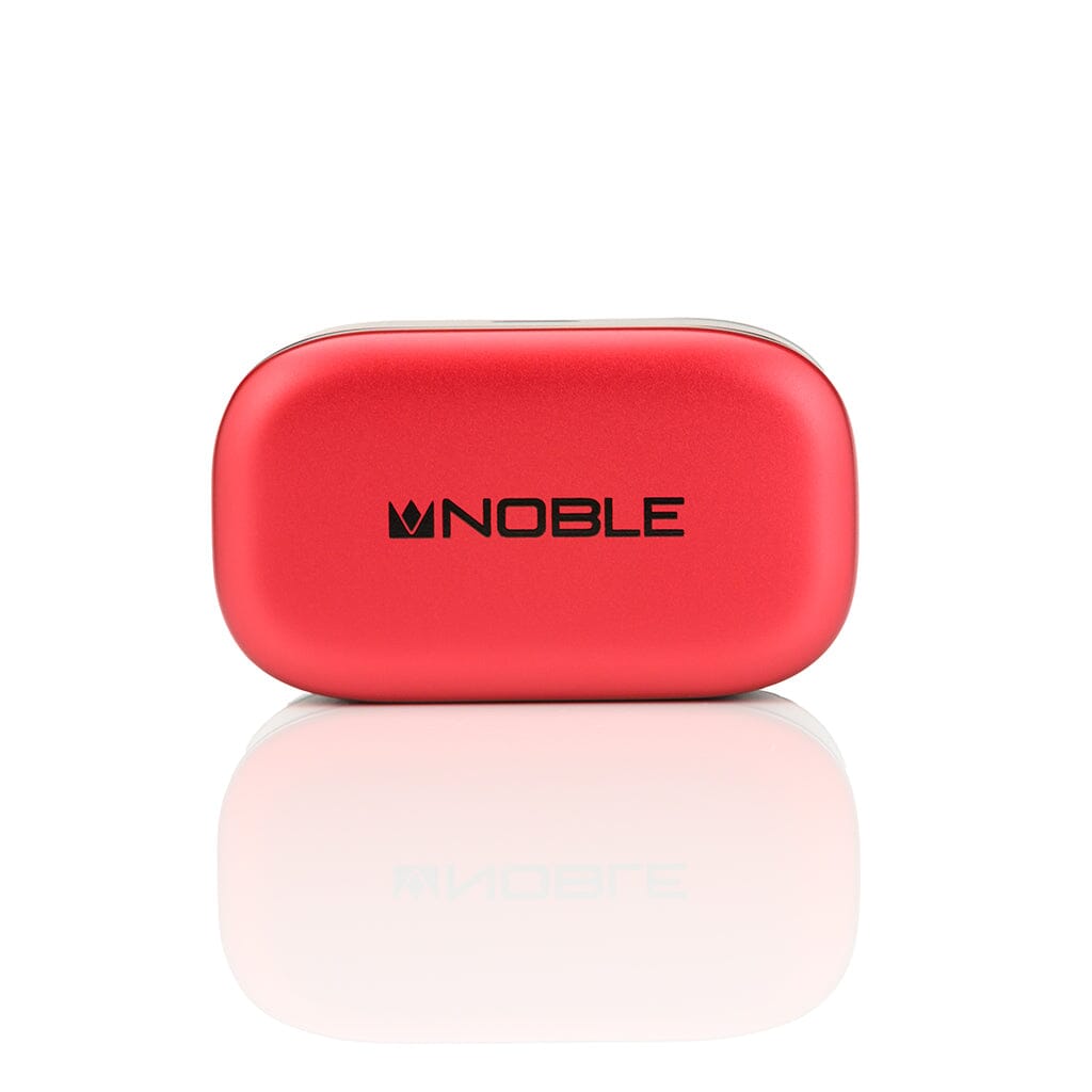A red, rectangular case with rounded edges and "NOBLE" in black on the front, designed for Noble Audio FoKus Amadeus True Wireless In-Ear Headphones by Noble Audio, shown against a white background with a reflection below.