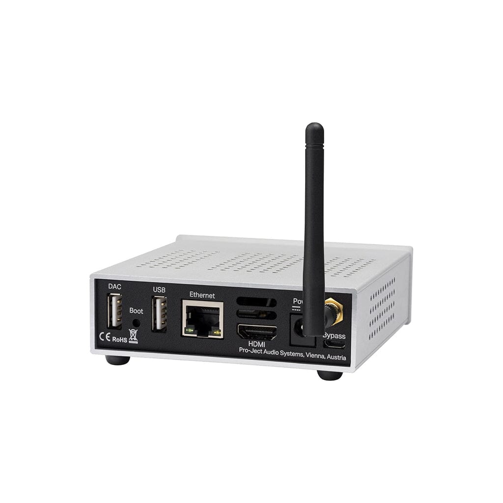 The Pro-Ject Audio Systems Stream Box S2 Ultra is a compact, rectangular network streamer with an antenna, USB, HDMI, Ethernet ports, DAC for hi-res audio, labeled inputs, and side vents. Photographed on a white background.