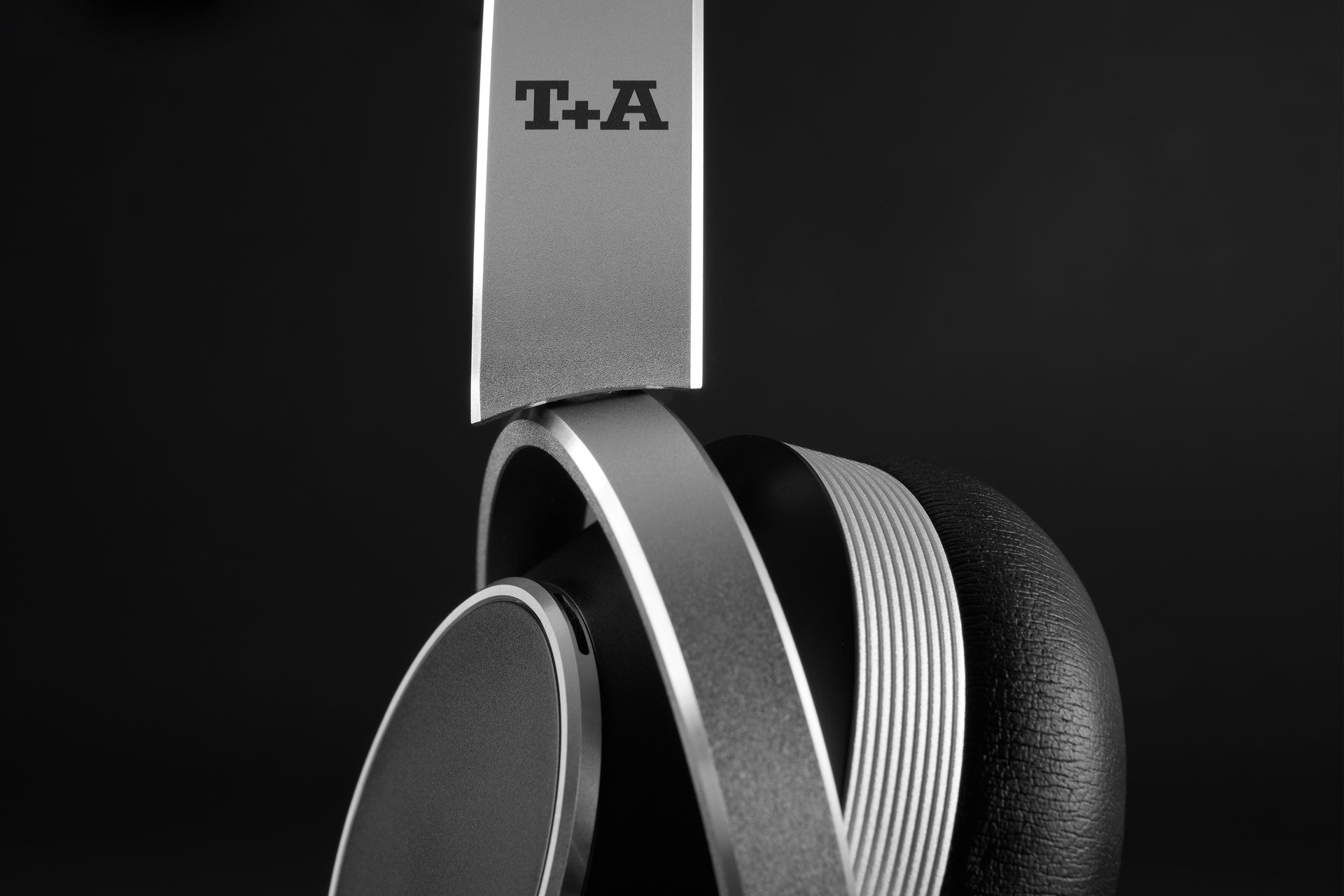 t+a solitaire t wireless headphones with active noise cancellation in black headband logo