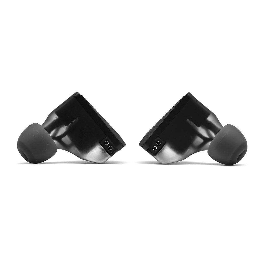 Two black TRUTHEAR Pure In-Ear Headphones with silicone ear tips face each other on a white background, highlighting their hybrid 4-driver technology and outstanding sound quality.