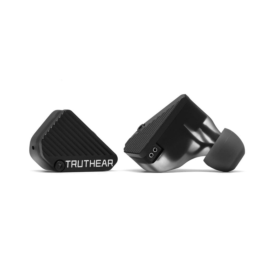 Two black TRUTHEAR Pure In-Ear Headphones—one flat showing the brand, one upright with a visible tip and ribbed texture—feature a hybrid 4-driver design for exceptional sound quality in a sleek, modern look.