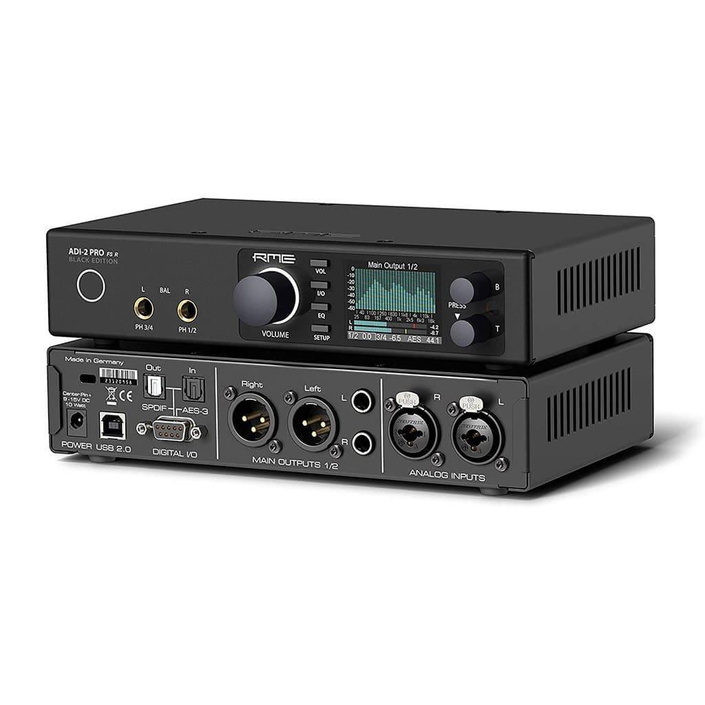 The RME ADI-2 Pro FS Black Edition - Open Box by RME is a black audio interface and AD/DA converter with multiple control knobs, buttons, input/output ports, and a color display, shown stacked against a white background.