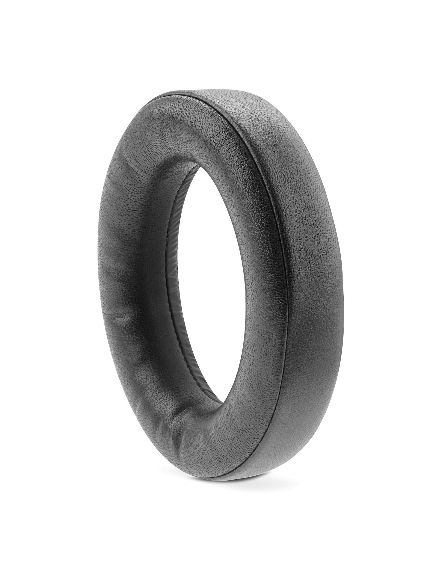A single black leather ear cushion for Focal Bathys headphones by Focal stands upright on a white background.