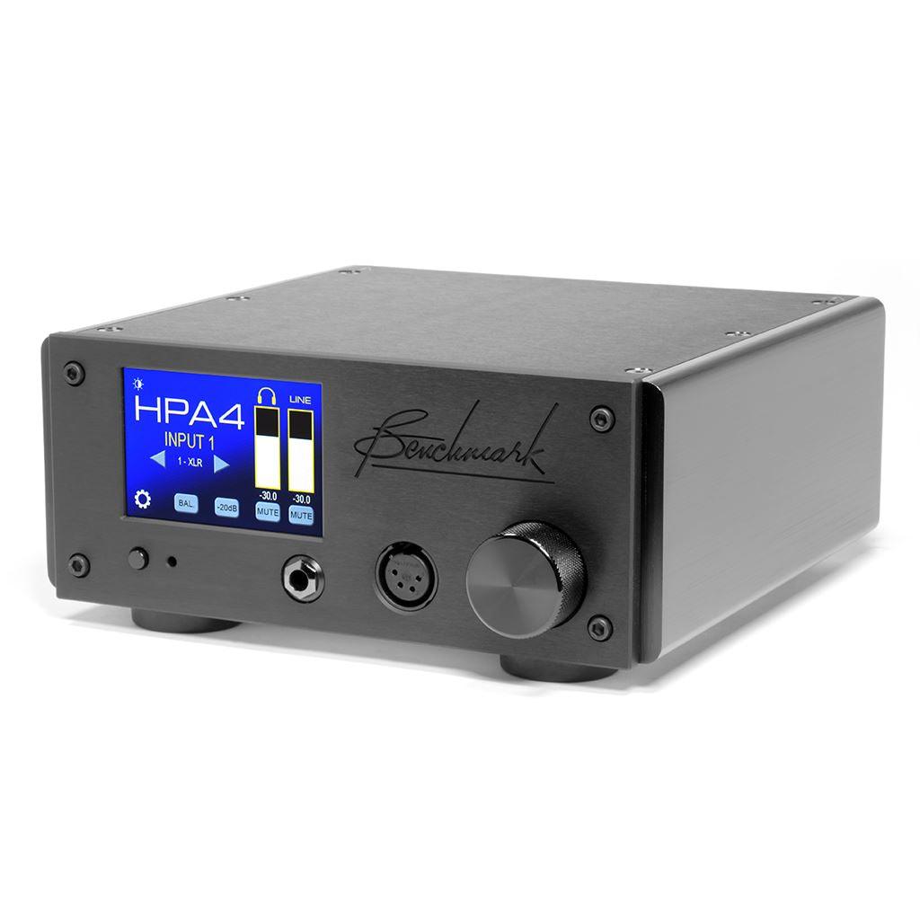 The black Benchmark Media Systems HPA4 Desktop Headphone Amplifier features a blue digital display and front control knobs, uses THX Achromatic Audio Amplifier technology, and is shown on a white background.