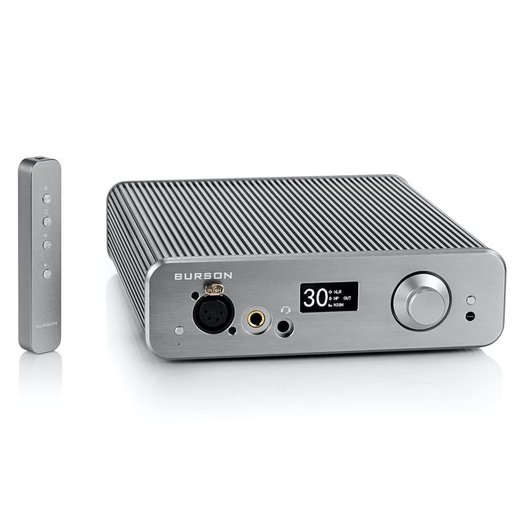 A silver Burson Audio Soloist 3X Performance amplifier with Max Current Power Supplies, remote control, ribbed top, multiple input/output ports, a display reading 30, and a large front control knob.