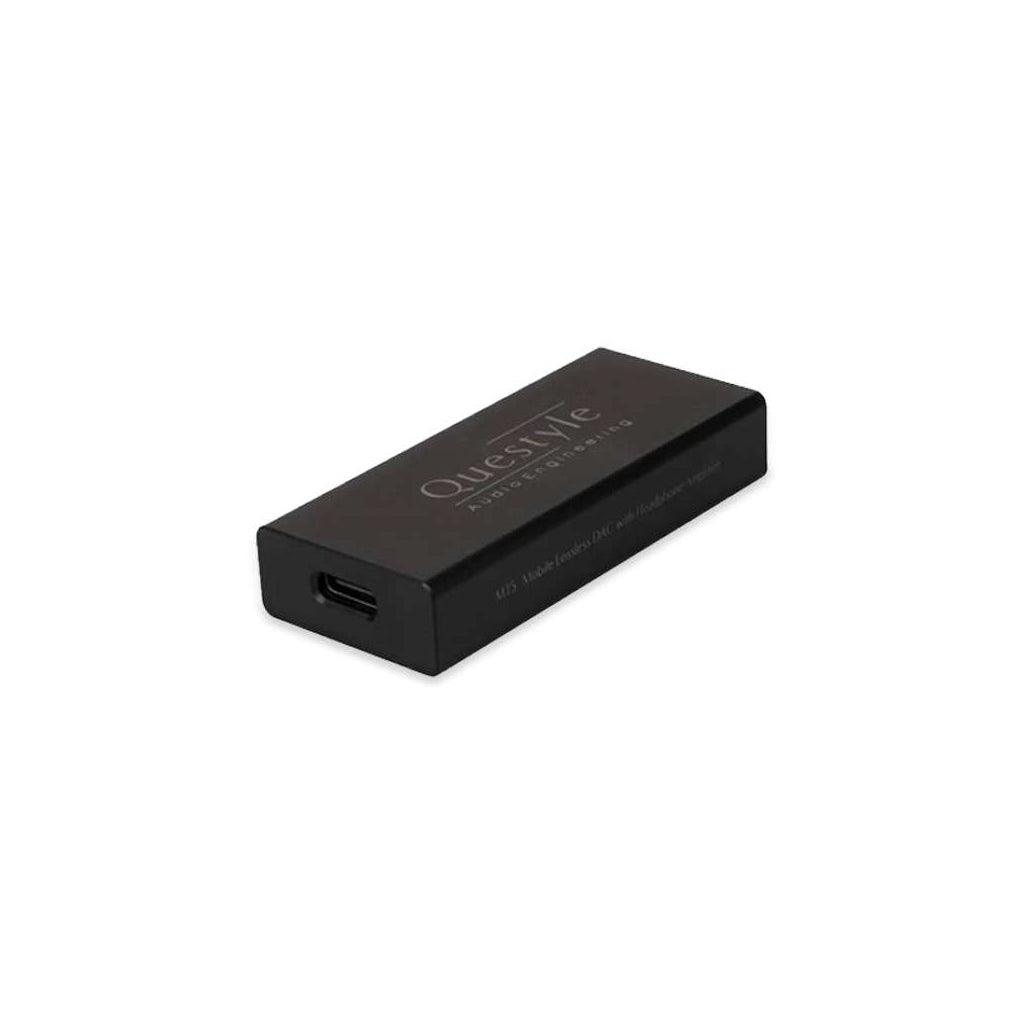 The Questyle M15 USB Portable DAC & Headphone Amplifier - Open Box is a sleek, black rectangular device with the Questyle logo on top and a USB-C port, offering premium hi-res audio for portable listening, shown against a plain white background.