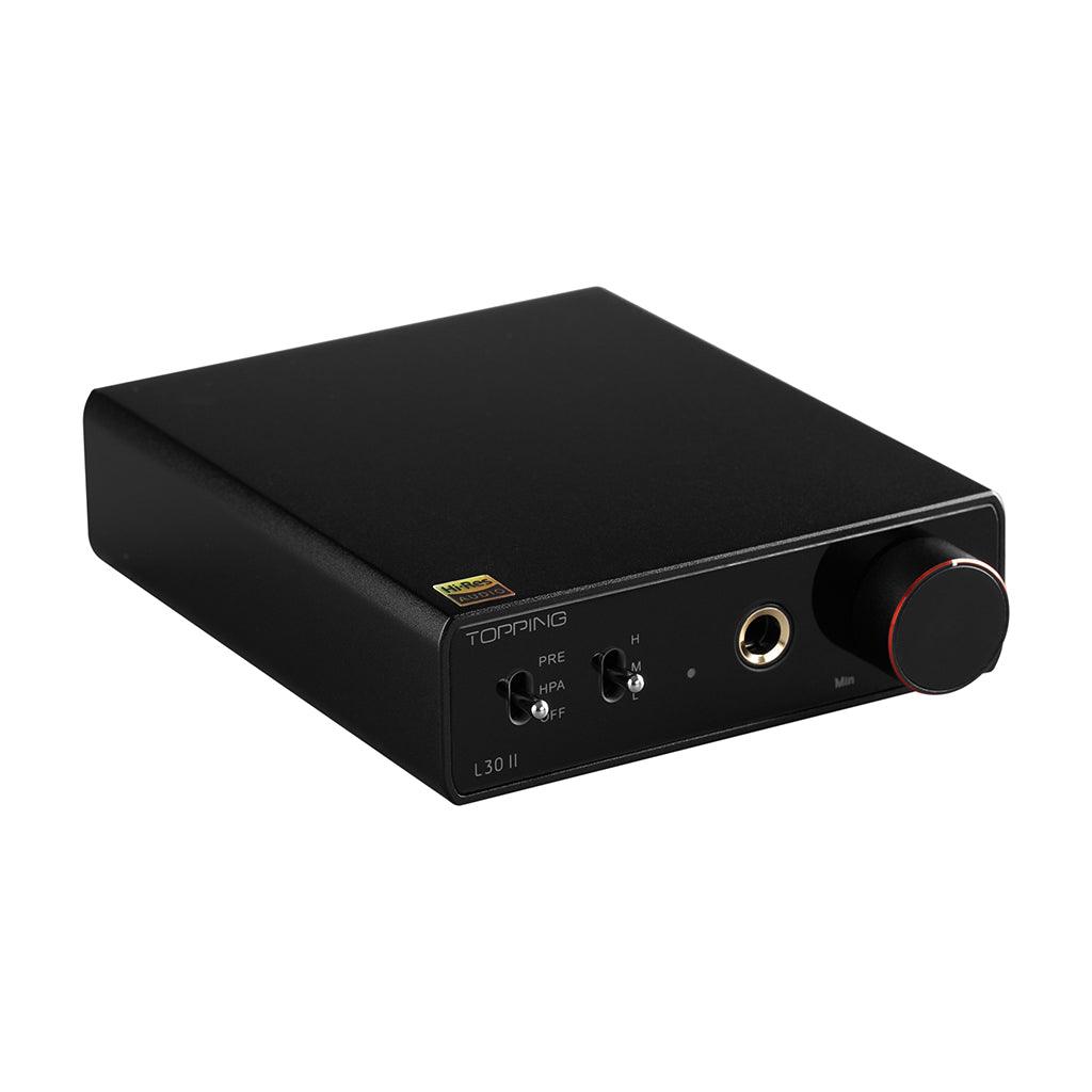 The Topping L30 II by Topping is a black headphone amplifier with a large volume knob, headphone jack, toggle switches, and a gold Hi-Res Audio sticker—powered by an advanced NFCA module for high-fidelity sound.