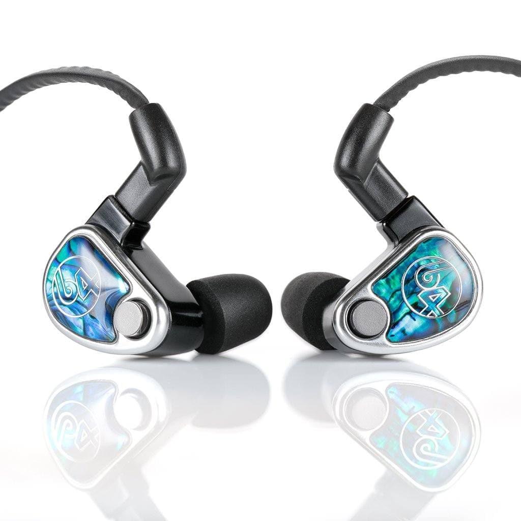 The 64 Audio Nio In-Ear Headphones (Open Box) by 64 Audio, featuring black earpieces, foam ear tips, and bold blue-abalone faceplates with a stylized logo, are displayed on a white reflective surface.