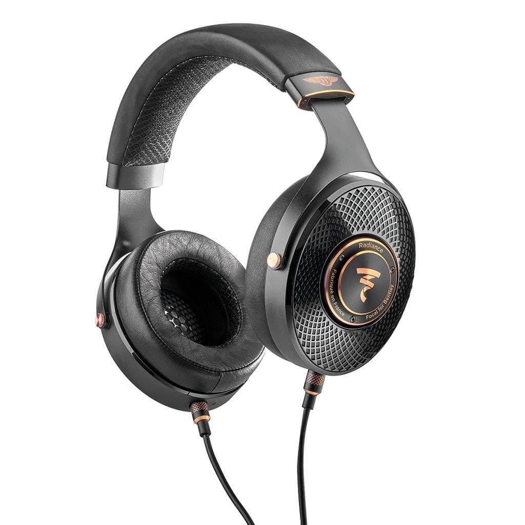 Focal Radiance - Open Box by Focal: black over-ear wired headphones with a padded headband, circular mesh-design ear cups, and gold accents inspired by Bentley, displayed on a white background.