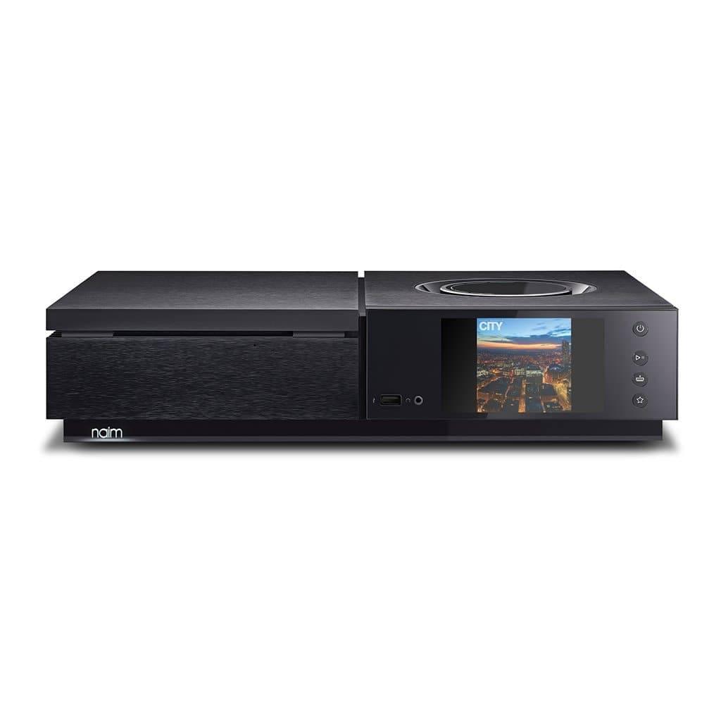 The Naim UNITI STAR by Naim is a sleek black audio streaming device featuring a cityscape display, right-side buttons, a circular top control, and front USB port—enjoy modern design with easy access to your favorite streaming services.