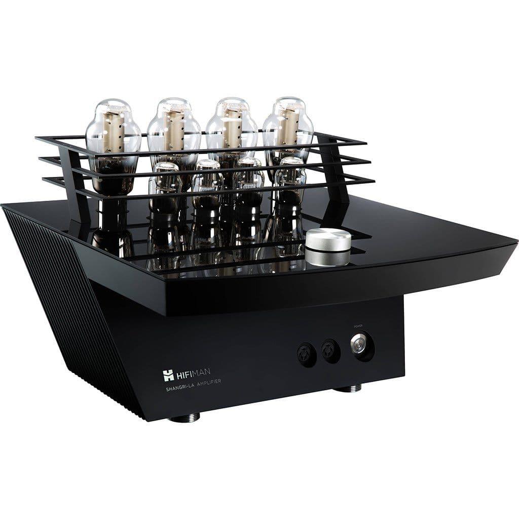 The Hifiman Shangri-La SR Electrostatic Headphones & Amp System by Hifiman features a modern black design with six top vacuum tubes, angled side vents, and front controls—ideal for high-end electrostatic headphone performance.