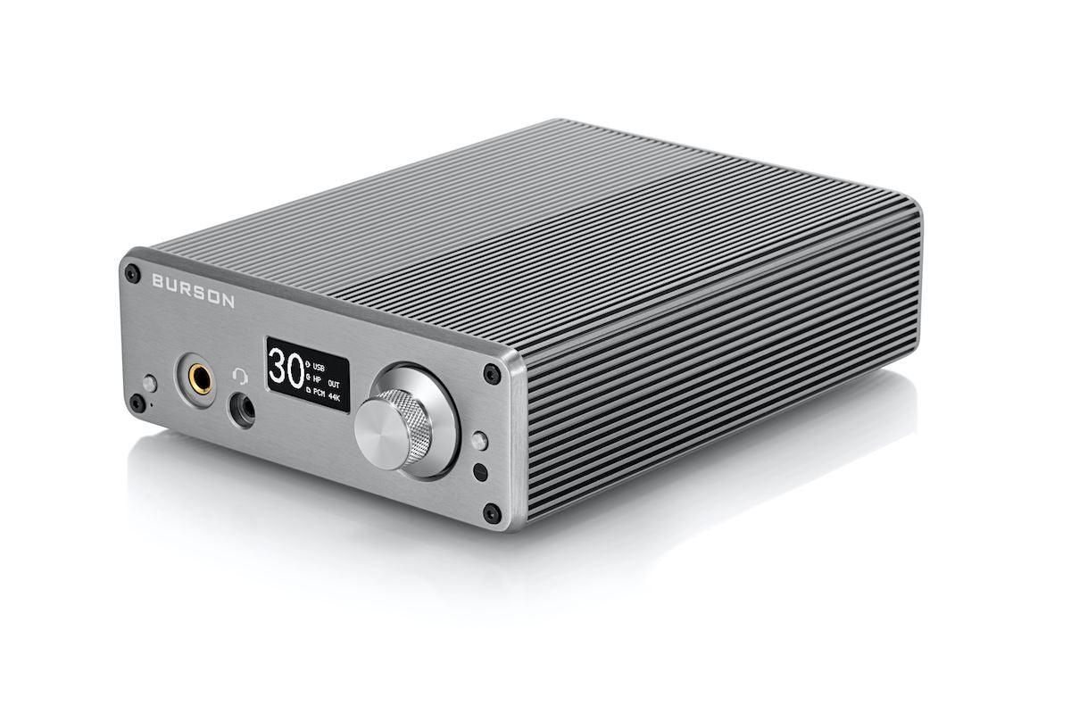 A silver Burson Audio Playmate 2 Class-A amplifier with ridged metal casing, front headphone jack, small digital display reading 30°, built-in DAC, and large volume knob, shown on a white background.
