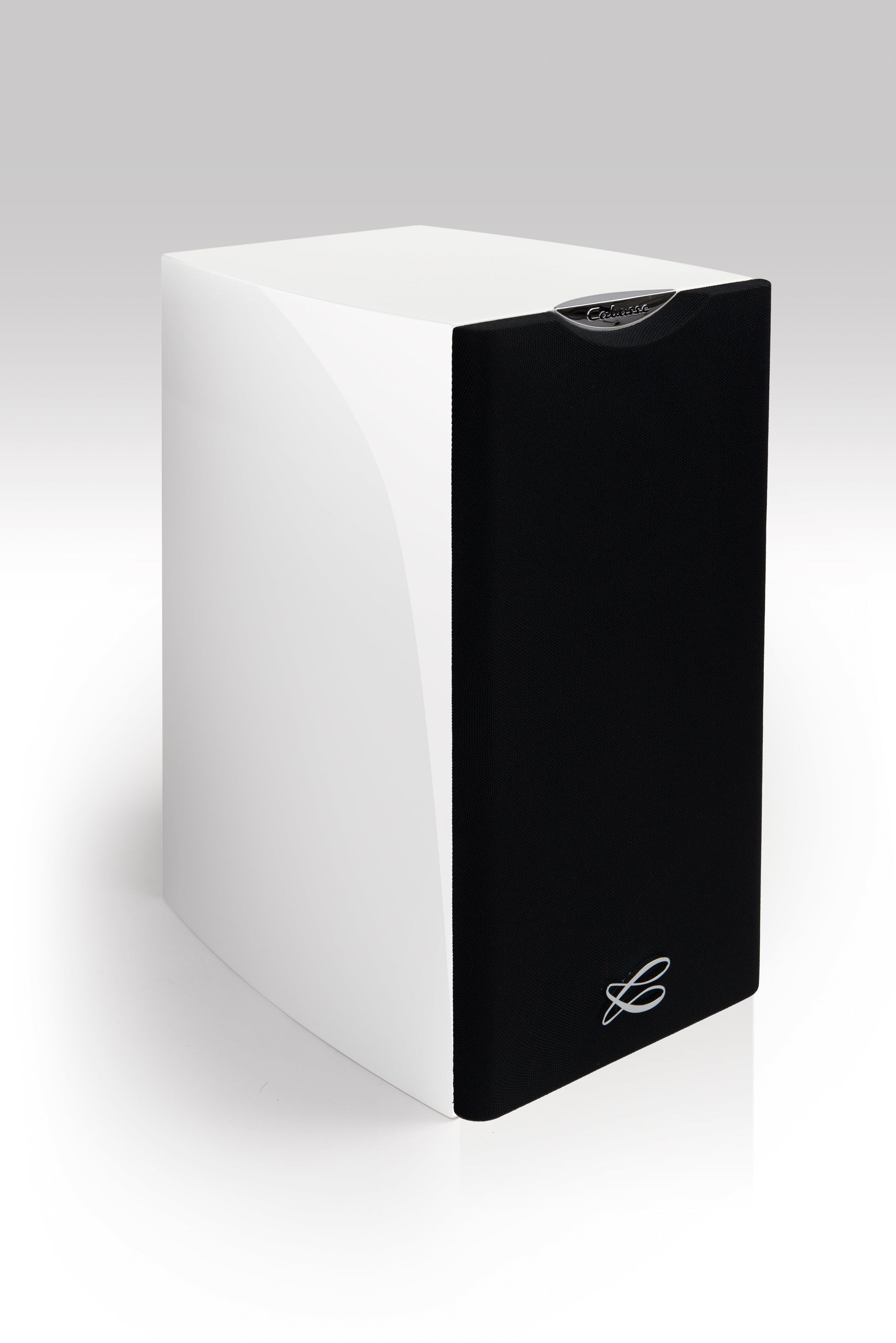The Cabasse MINORCA MC40 Bookshelf Speakers by Cabasse are sleek, rectangular, ultra-compact 3-way speakers in glossy white with a black front grille and silver logo at the bottom, shown on a plain white background.