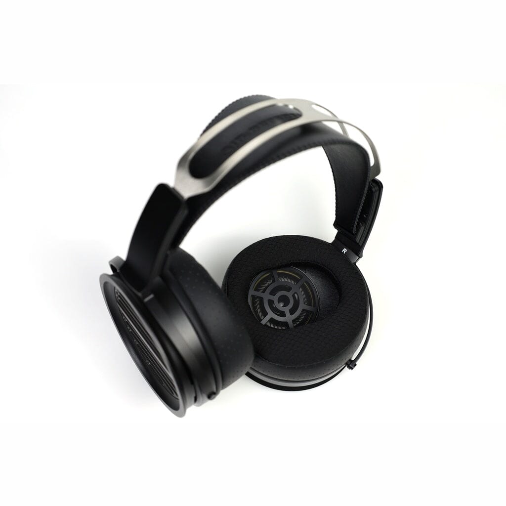 Black Aune Audio AR3000 over-ear open-back headphones with a metal headband, angled to show the inner driver and earcup.