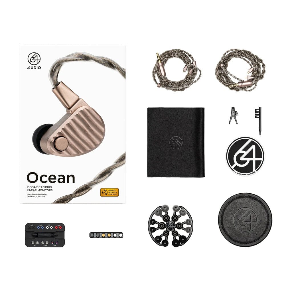 Discover the 64 Audio Ocean In-Ear Headphones by 64 Audio—flagship universal in-ear monitors with an advanced hybrid driver design. This comprehensive set includes the headphones with cables, a cleaning tool, logo cloth, carrying case, multiple sizes of ear tips, user guide, and elegantly branded “Ocean” packaging.