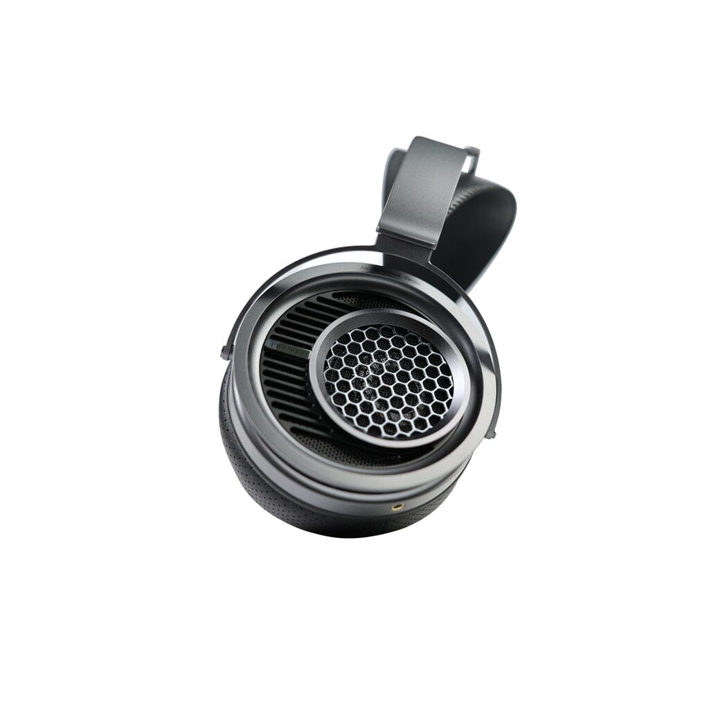 A detailed close-up of a single black and silver Aune AR9000 headphone by Aune Audio, featuring an open-back design with a honeycomb-patterned grille on a white background, highlighting its premium flagship craftsmanship.
