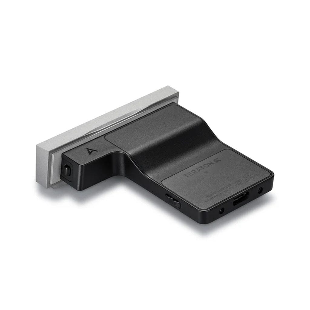 A black rectangular Astell & Kern SEM2 All-In One Module for SE180 with a silver edge, ports, and buttons appears on a white background—matching the style of the SE180 digital audio player’s interchangeable DAC amplifier module.