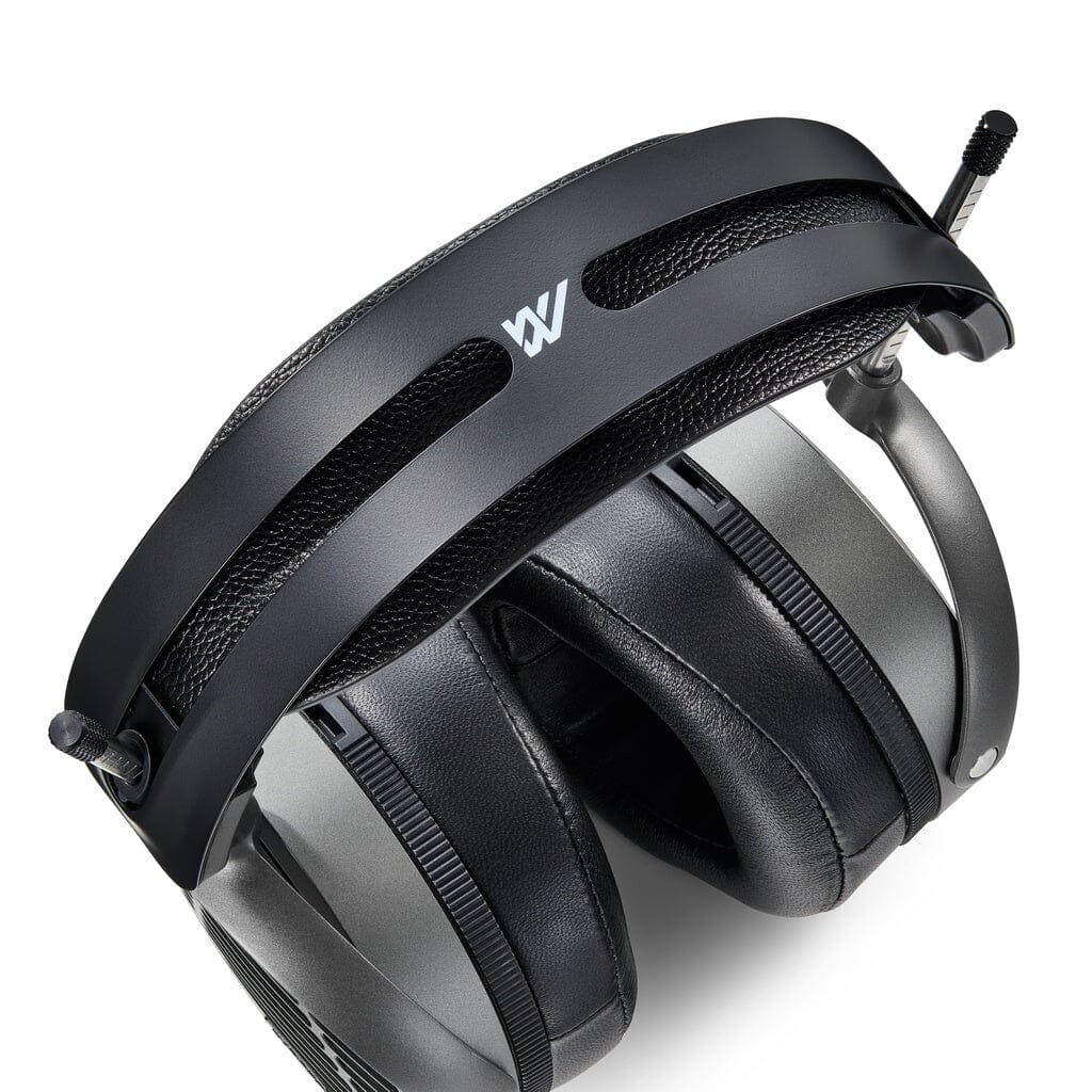 Audeze MM-520 over-ear headphones by Audeze in black, featuring planar magnetic drivers, padded headband, metal frame, and top logo, shown on a white background.