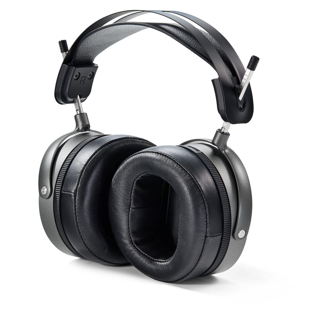 The Audeze MM-520 Headphones by Audeze are over-ear studio headphones with thick black cushioned pads, an adjustable metal headband, and planar magnetic drivers, shown on a white background.