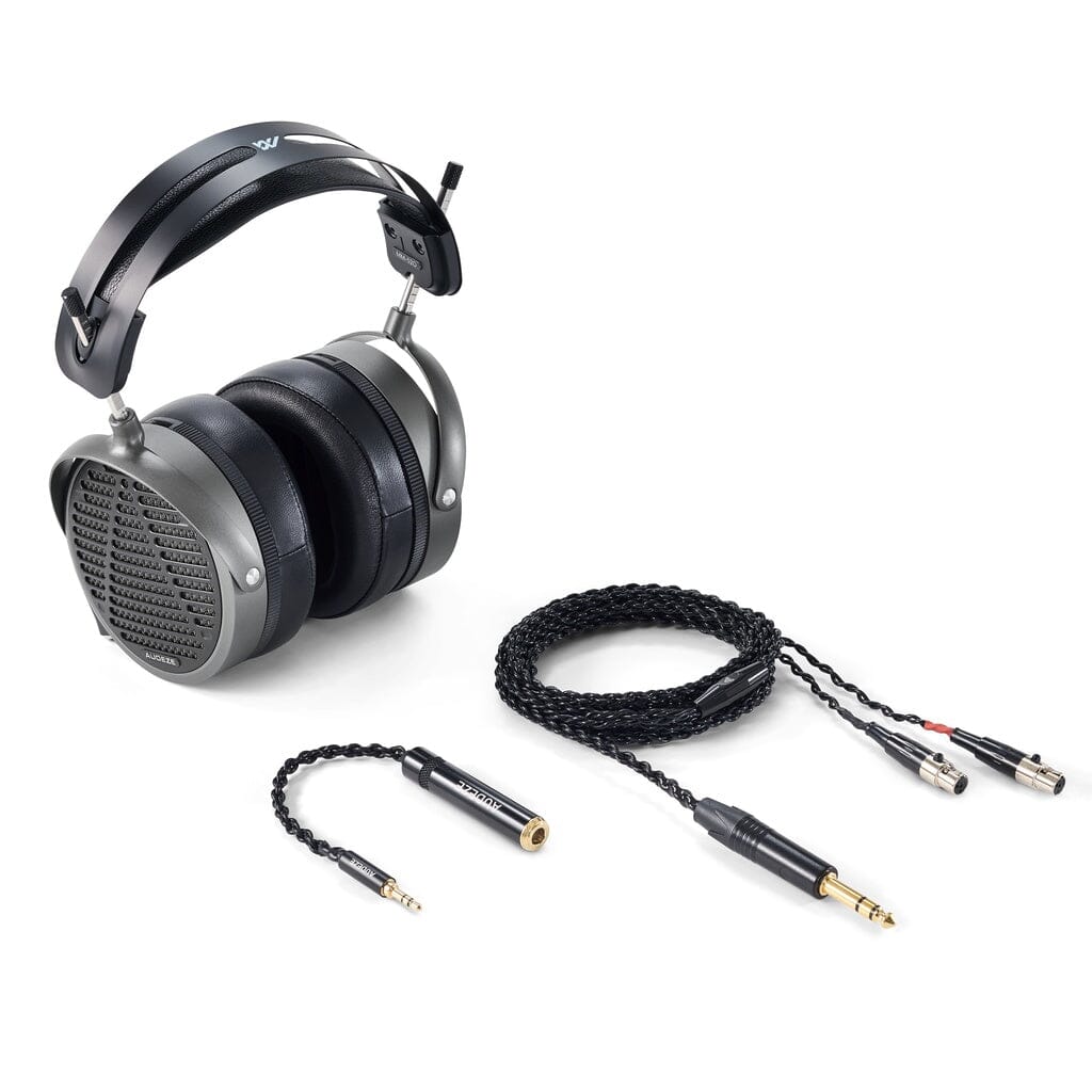 The Audeze MM-520 Headphones feature a sleek metal and black over-ear design, shown with a coiled audio cable and two adapters on a white background. They use planar magnetic drivers for superior sound quality.
