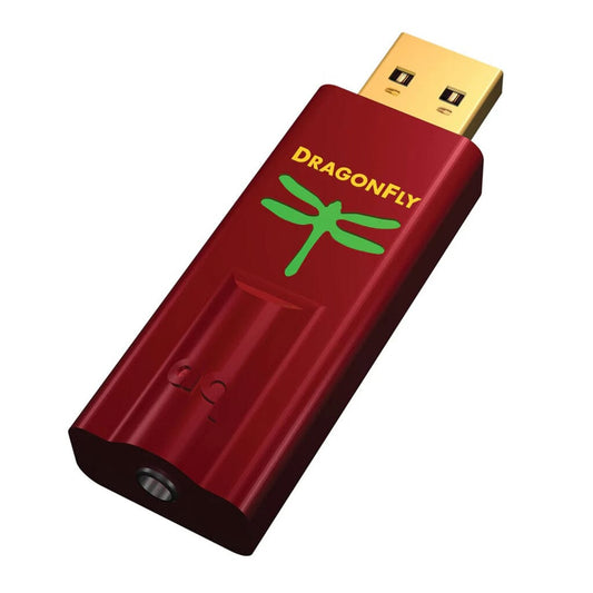An AudioQuest Dragonfly Red - Open Box USB DAC and headphone amp, featuring a green dragonfly graphic and gold USB connector, is shown on a white background.
