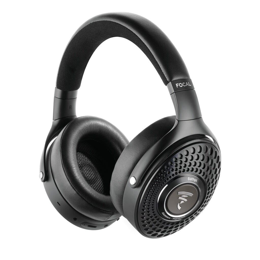 The Focal Bathys wireless noise-canceling headphones by Focal are black over-ear headphones featuring cushioned ear pads and a padded headband, with a distinctive honeycomb pattern on the ear cups. These headphones provide both comfort and style, along with a customizable EQ for a tailored listening experience.