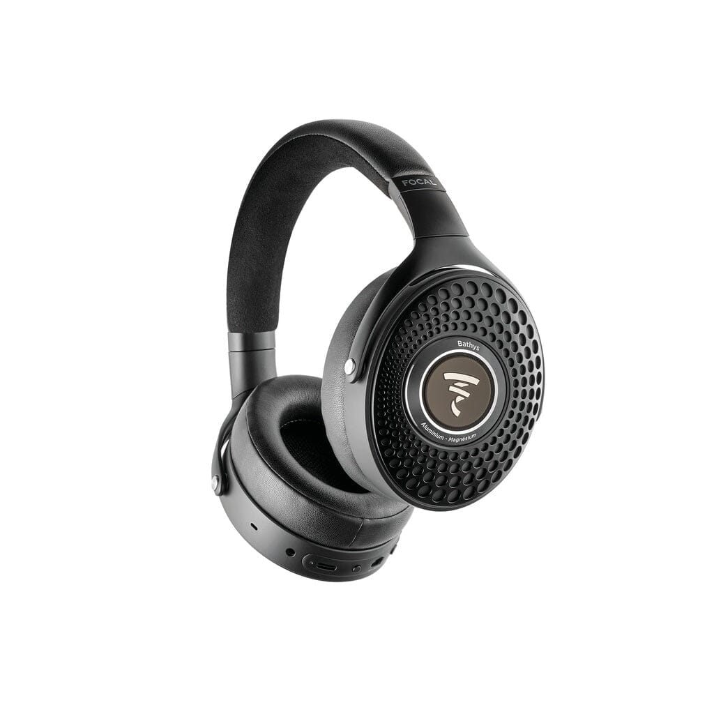 The Focal Bathys headphones by Focal are black over-ear wireless noise-canceling headphones with a textured circular pattern on the ear cups, a padded headband, and visible side buttons, shown against a white background. With customizable EQ for personalized sound, these headphones offer an immersive listening experience.