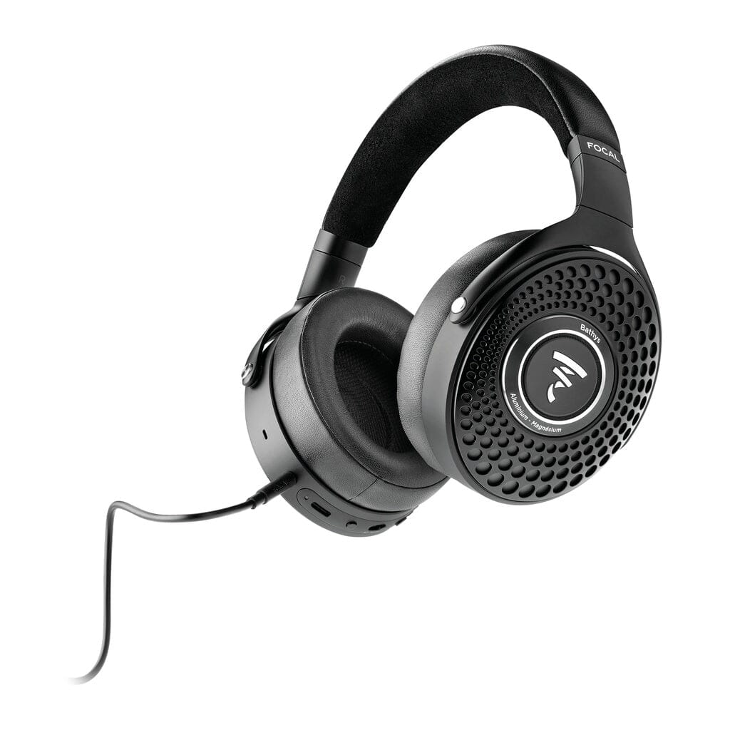 Experience the Focal Bathys: black over-ear wired headphones from Focal, featuring cushioned ear pads and perforated detailing on the ear cups. The iconic Focal logo is displayed prominently on the side, echoing the renowned Bathys line. The cable connects to the left ear cup, while customizable EQ settings let users personalize their audio experience.