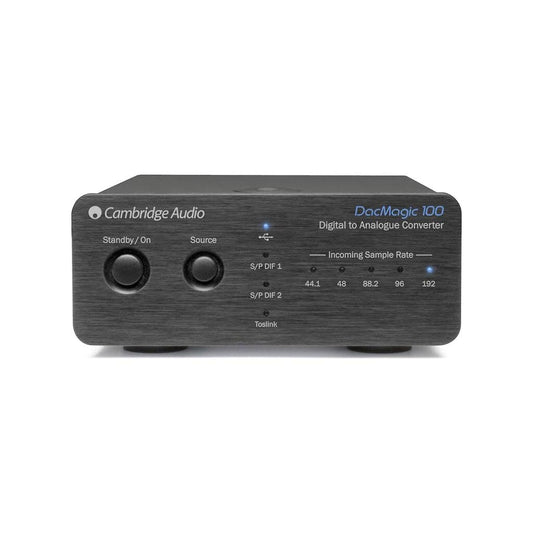 Front view of the Cambridge Audio DacMagic 100 DAC shows standby/on and source buttons, input and 24-bit/192 kHz indicator lights, and Cambridge Audio branding on the top left and right.