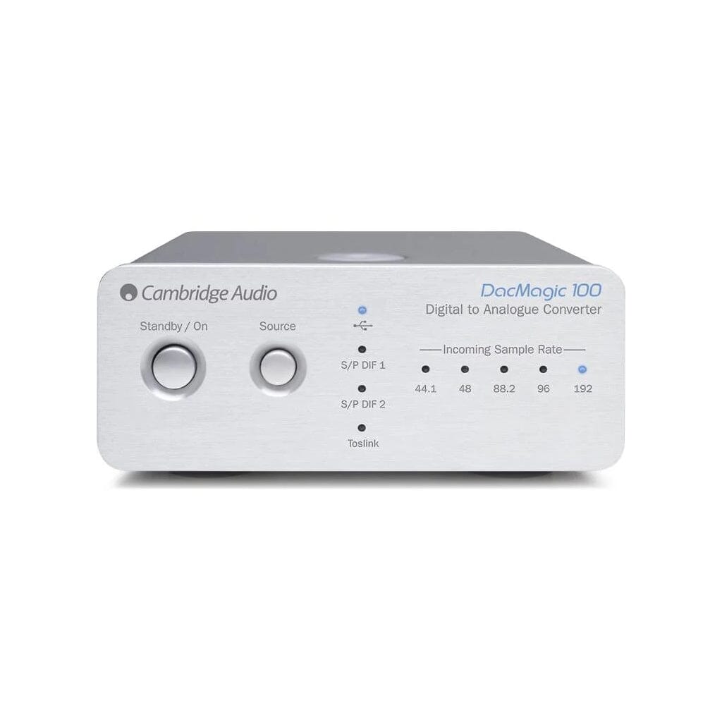 Front view of the Cambridge Audio DacMagic 100 by Cambridge Audio, showing control knobs, indicator lights, and labels for standby/on, source selection, and digital audio sample rates up to 24-bit/192 kHz.