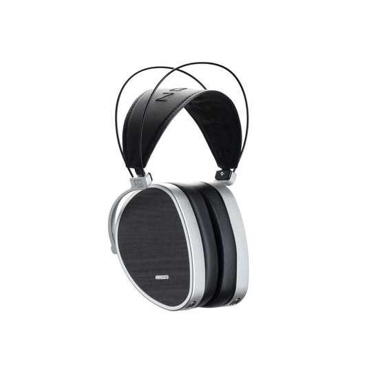 The Dan Clark Audio AEON CORE Headphones are over-ear closed-back planar magnetic headphones with rectangular black ear cups featuring a wood-like texture, silver edges, and a padded black headband supported by two thin wires.