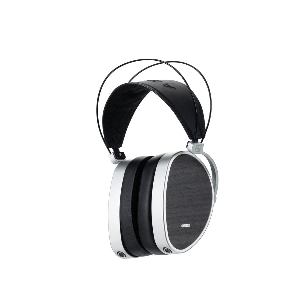 Dan Clark Audio AEON CORE Headphones are over-ear, closed-back headphones with a silver frame, black cushioned ear pads, wood-textured finish, and a black headband with slim metal support—reflecting Dan Clark Audio’s signature design.
