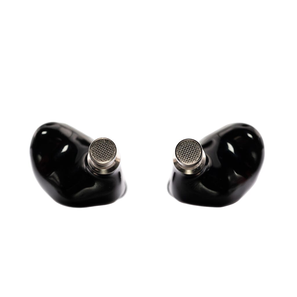 A pair of Crinear Daybreak In-Ear Headphones features metallic mesh speaker grills and a black finish, positioned symmetrically on a white background, offering audiophile-grade sound quality.