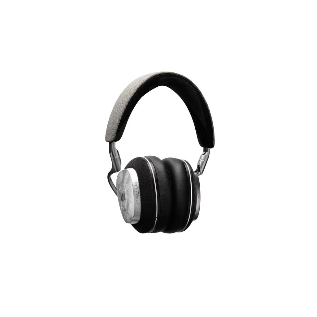 The Noble Audio FoKus Artemis Wireless Headphones by Noble Audio feature black cushioned ear pads, silver metal accents, active noise cancellation, and a padded gray and black headband, shown against a white background.
