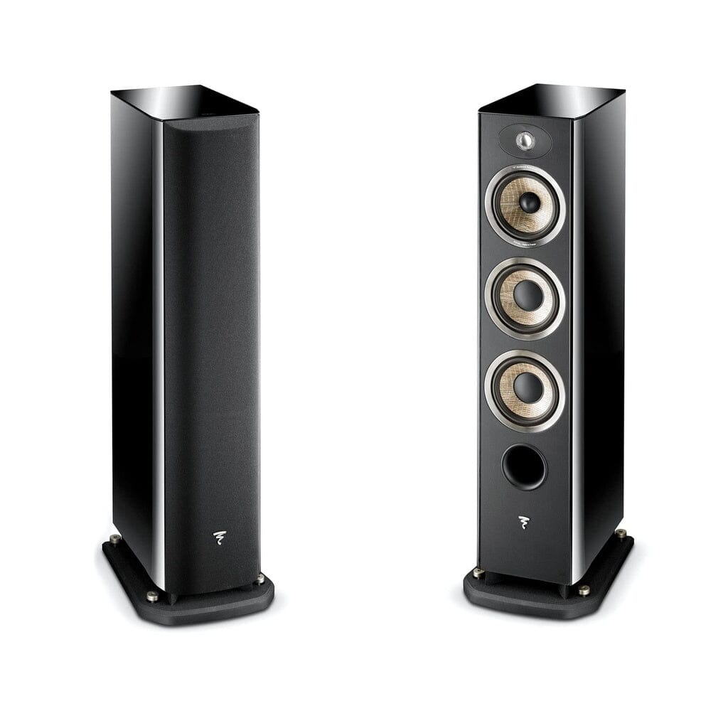 Two Focal Aria 926 floorstanding speakers (Gloss Black) are shown. One has a front grille, while the other displays three circular drivers and a tweeter. Both stand tall on sturdy rectangular bases.