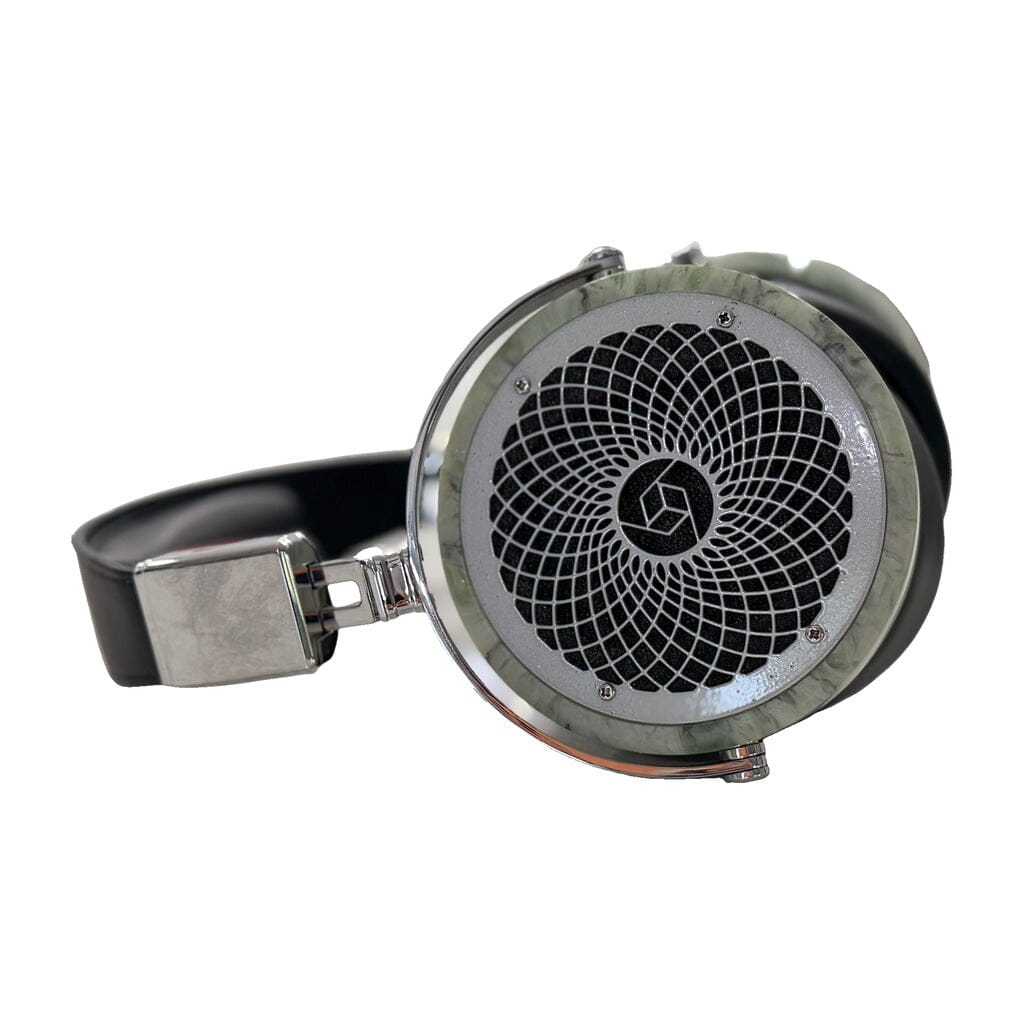 A close-up of the Rosson Audio Design RAD-0 headphones by Rosson Audio Design, featuring a geometric patterned metal grille on the ear cup and a black headband—highlighting its premium planar magnetic technology in open box C condition (Clearance - 215).