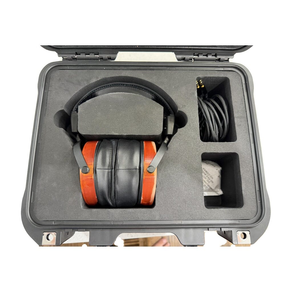 A pair of Rosson Audio Design RAD-0 headphones in Open Box C Condition (Clearance - 74) is neatly organized in a protective carrying case with foam compartments, accompanied by a coiled cable and a small bag—all presented as an open-box set from Rosson Audio Design.