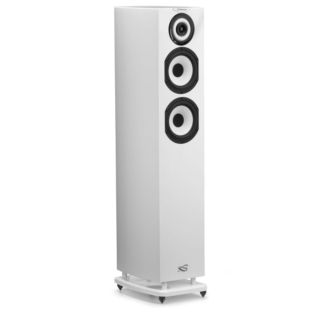 The Cabasse JAVA MC40 Floorstanding Speaker by Cabasse is a tall, white speaker with three round front drivers and a matching base with pointed feet, delivering high-fidelity sound.