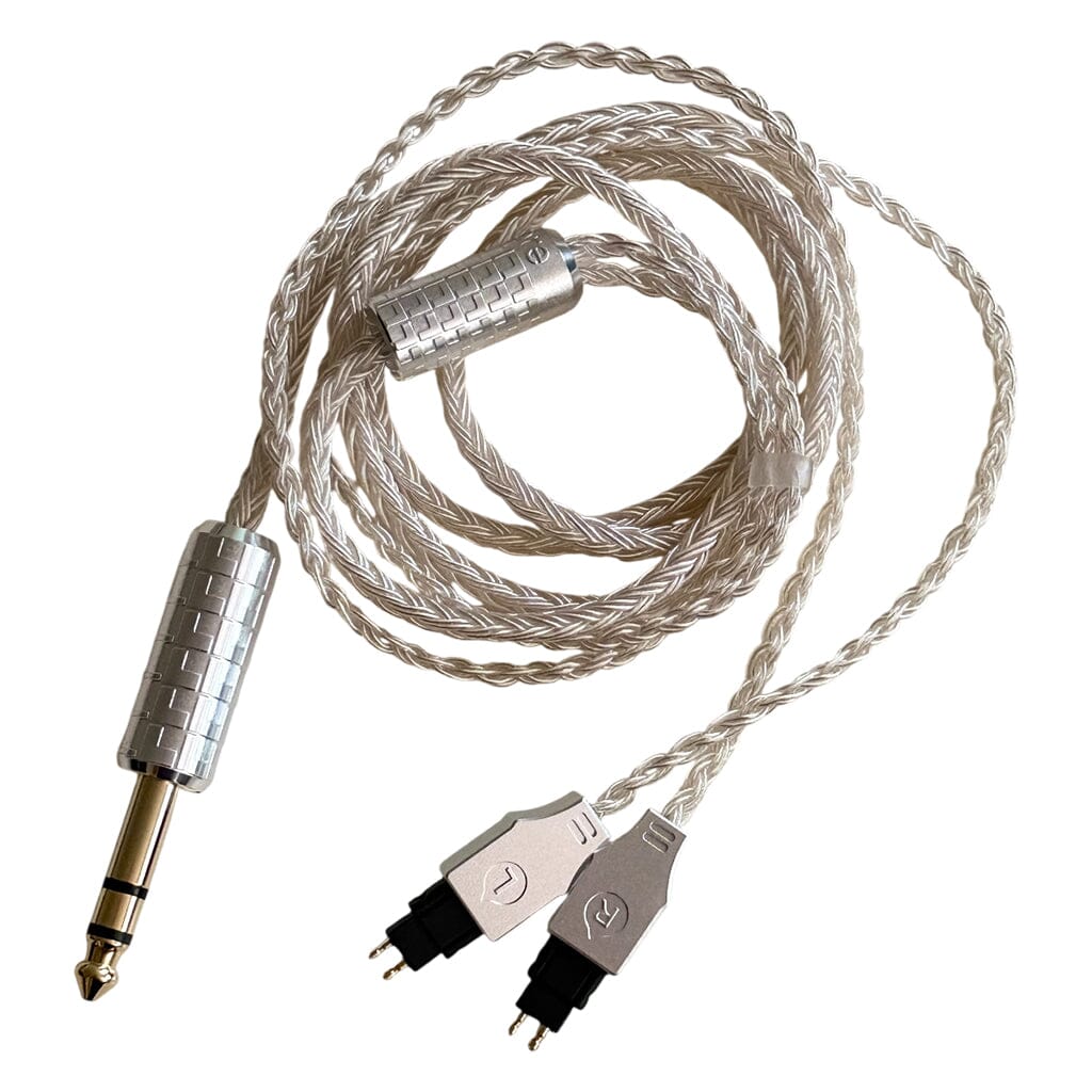 The Listenmore Etched Headphone Cable for Sennheiser HD 600 Series features a silver braided design, a 1/4-inch (6.35mm) stereo plug, and L/R connectors, shown against a white background.
