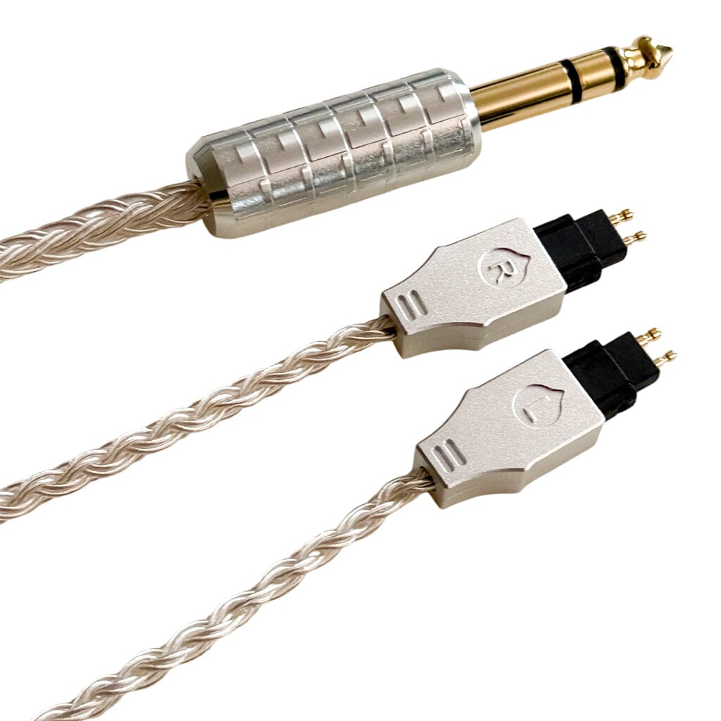 The Listenmore Etched Headphone Cable for Sennheiser HD 600 Series features a braided design, a silver 6.3mm stereo plug, and dual-pin connectors, shown isolated on a white background.