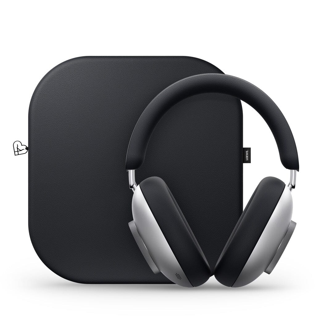 The Loewe Leo Wireless Headphones by Loewe, featuring premium silver and black over-ear design and adaptive noise cancellation technology, are shown standing upright in front of a matching black square carrying case with rounded corners on a white background.